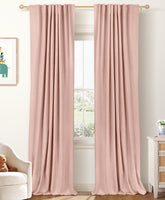 Cortinas 100 por ciento Blackout Shield en rosa empolvado bloquean la luz para dormir mejor.