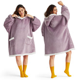 Manta poncho Bedsure con exterior de franela cálida para el hogar.
