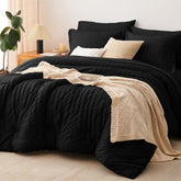 CozyLux edredón tamaño rey negro, textura suave y cálida para noches cómodas.