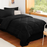 CozyLux edredón twin negro en primer plano, textura suave para descanso cómodo