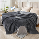 Manta LOOBANI impermeable doble cara protege muebles ante derrames.