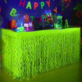 Mega-L Glow: falda de mesa con flecos de foil neón amarillo, ideal para fiestas.
