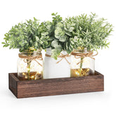 Mkono centro de mesa con frascos Mason iluminados para crear iluminación cálida