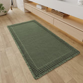 Alfombra RESARE para baño con diseño waffle y flecos, aporta estilo y absorbe agua.