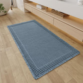 RESARE alfombra waffle azul frente: diseño texturizado que realza el baño y absorbe agua.