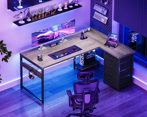 AODK escritorio L con tomas de energía para carga sin cables.