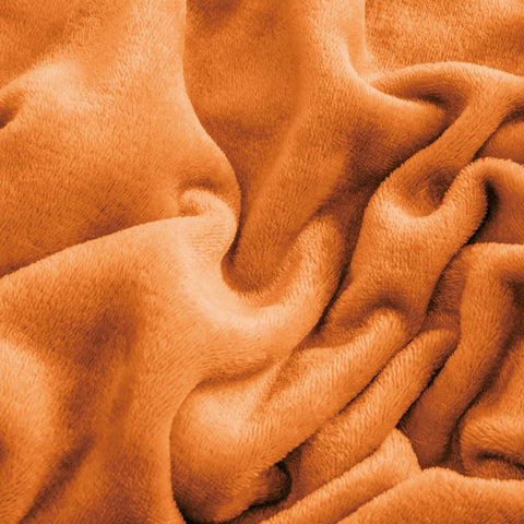 Textura felpa densa BEDELITE, color naranja calido, ideal para noches frias.