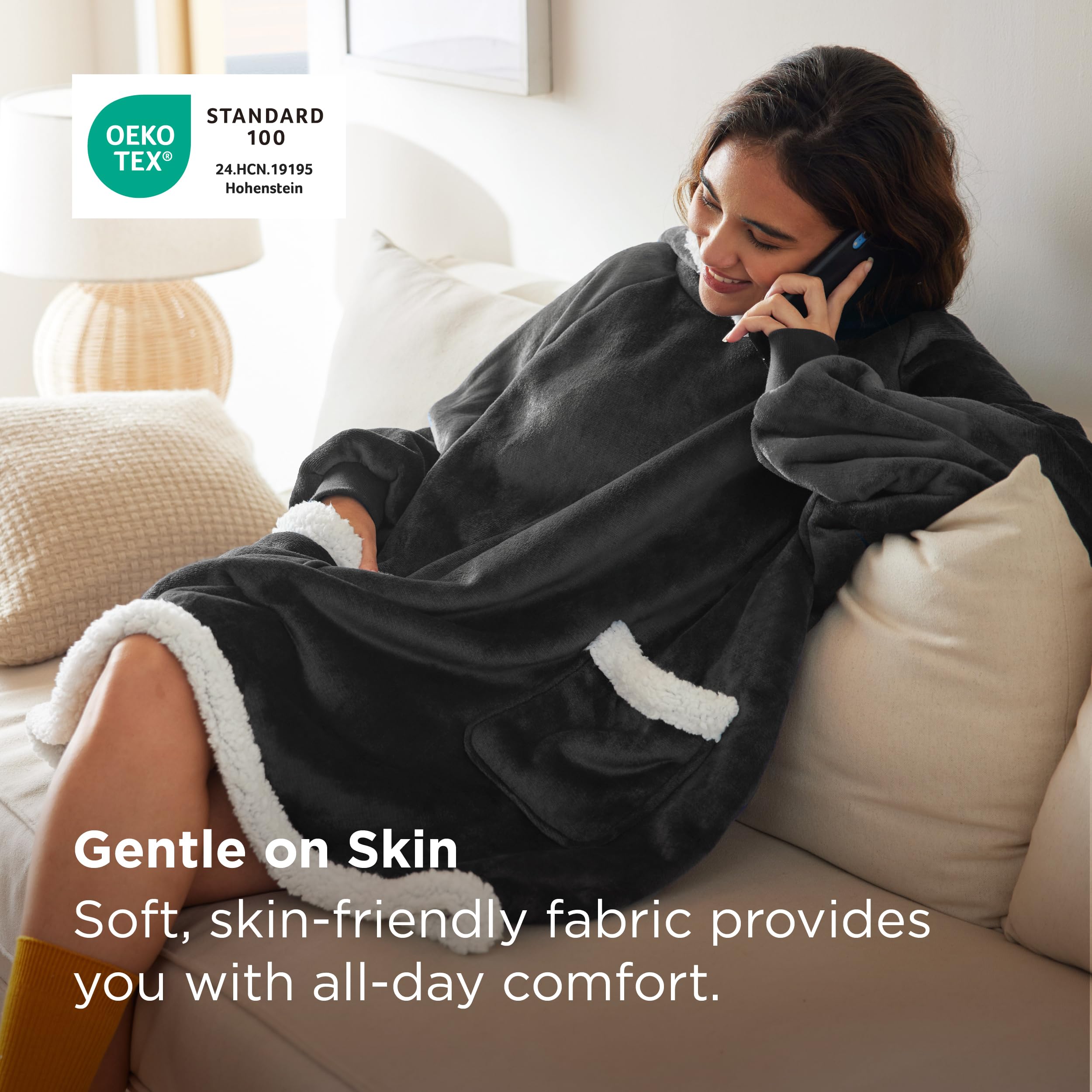 Bedsure manta capucha sherpa brazos libres, ideal para lectura y tareas.