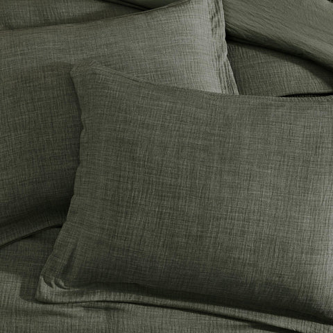 Geniospin Etiqueta certificado OEKO-TEX, garantizando calidad de tinturas.