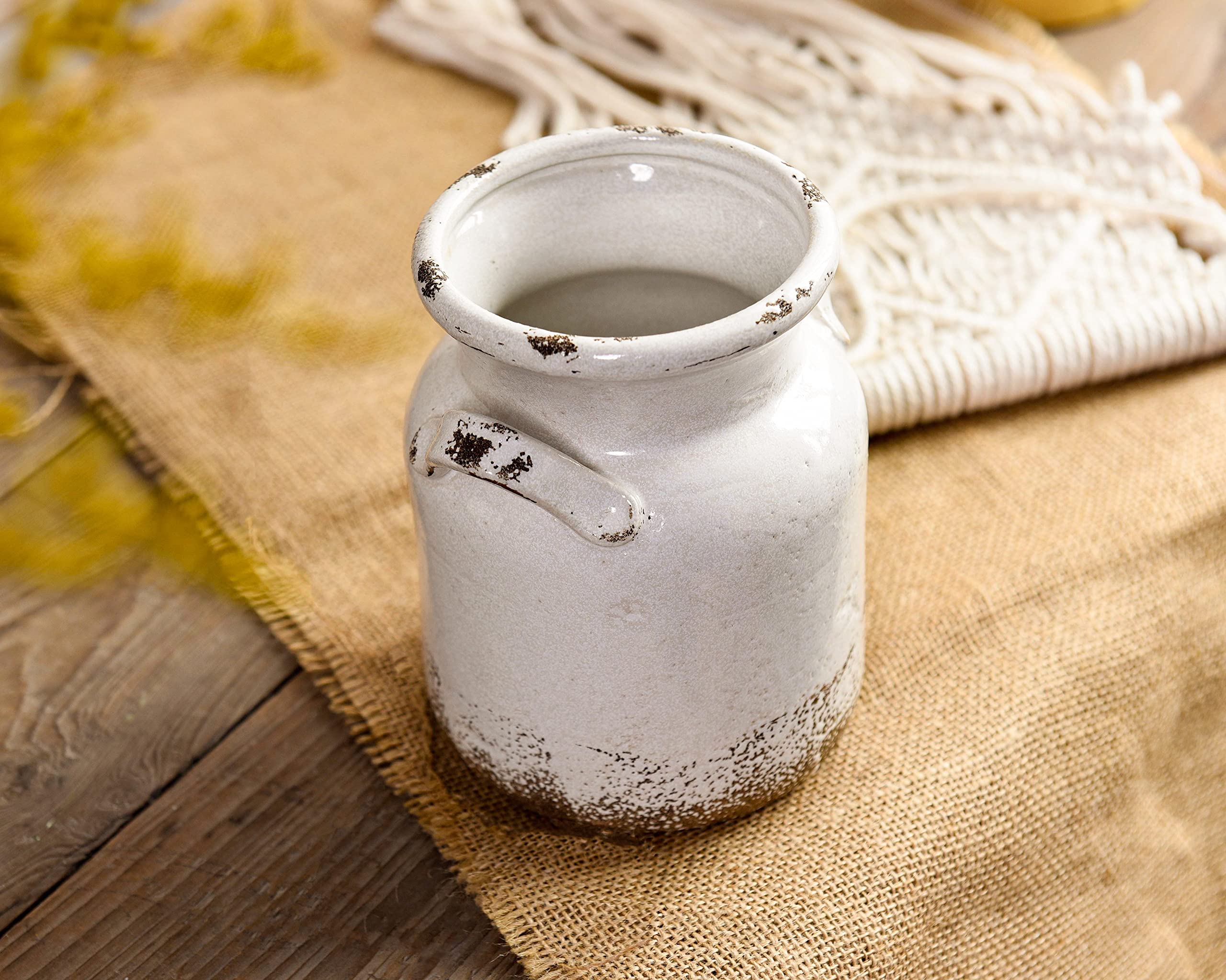 Apertura superior de 10 cm para ramilletes abundantes.