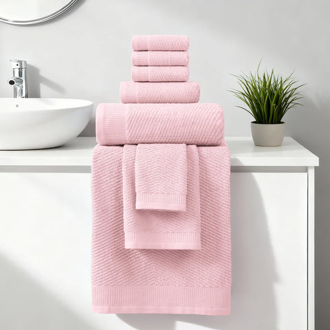 Conjunto rosa REDKISS ultra absorbente para huéspedes y hogar.