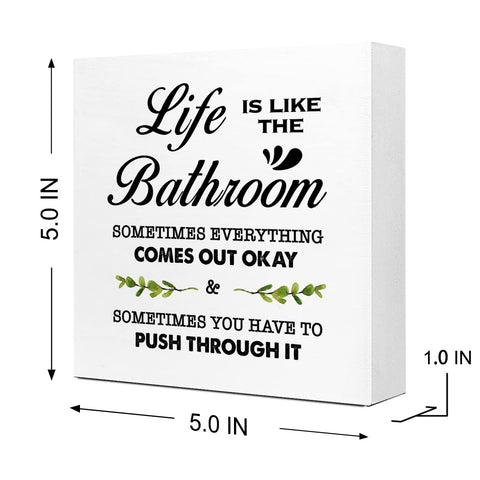 Detalle de la frase motivacional en madera de Ruvoty para inspiración diaria.