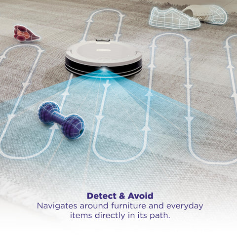 Shark Navigator en piso duro recogiendo suciedad con facilidad.