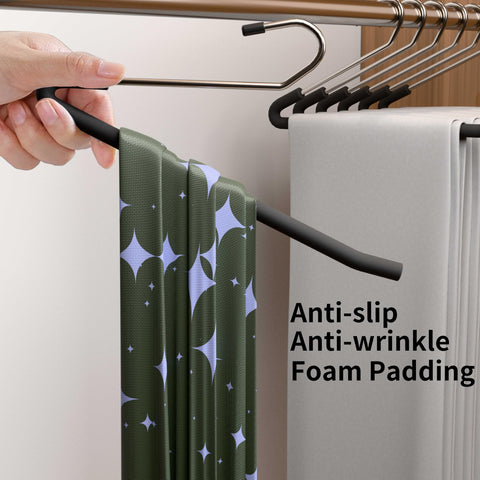 Ganchos SLMT para pantalones con apertura abierta permiten añadir o quitar prendas fácilmente.