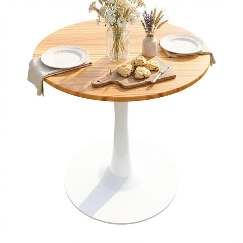 Mesa Tulip con base pedestal estable para dos personas.