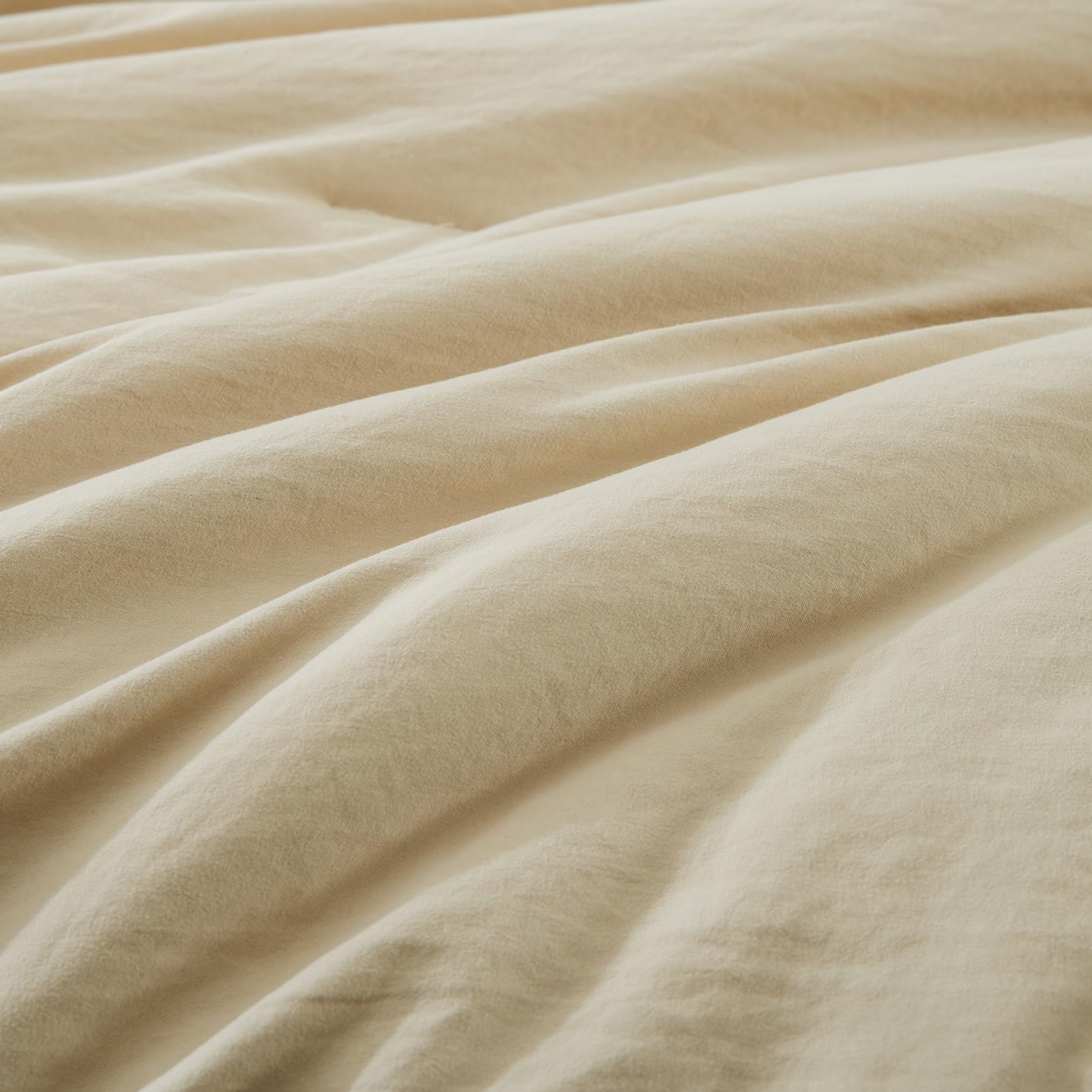 WRENSONGE Detalle cosido: costuras reforzadas que evitan desplazamiento del relleno.